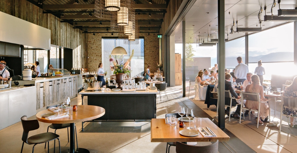 The cozy and elegant interior of Home Block Restaurant at Cedar Creek Estate Winery, courtesy of Adrian Photographers